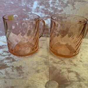 Two Rose Gold Arcoroc Rosaline Swirl Glass Mugs